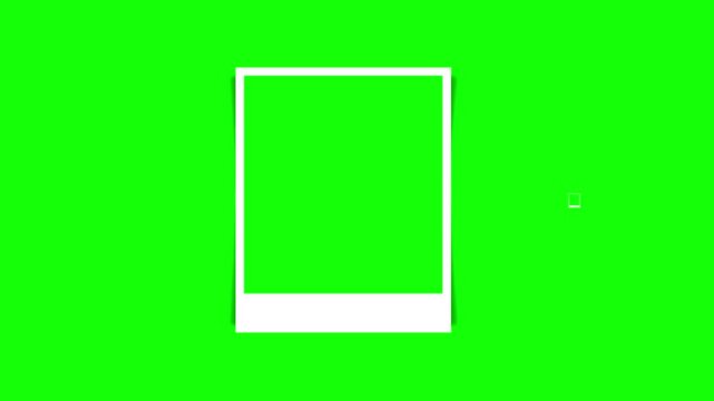 White instant photo frames sliding on chroma key green screen
