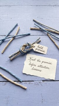 Rustic Twine Knot with 'Held Promise' Tag and 'Knot the Promise Before Attention Loosens' Note for Low Attention Span