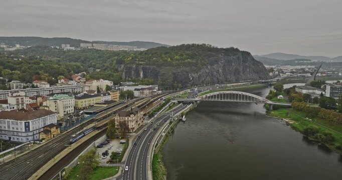 Usti nad Labem Czechia Aerial v8 panoramic panning view drone flyover Elbe river capturing bridge across the river, downtown cityscape and hillside landscape - Shot with Mavic 3 Cine - November 2022