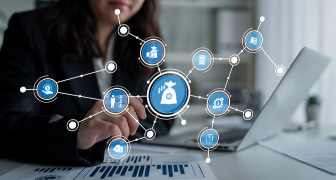 A business professional engages in data analysis in a modern office, showcasing technology and digital connections with icons relevant to finance and analytics. Crux