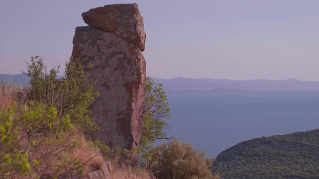 Ancient Stone Ruins of Assos with Lesbos Island Across the Aegean Sea