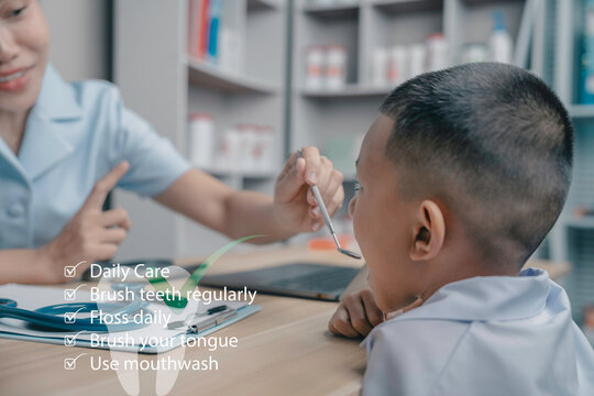 Pediatric dentist teaching child proper oral hygiene with daily dental care checklist for healthy teeth and preventive healthcare in a modern dental clinic.
