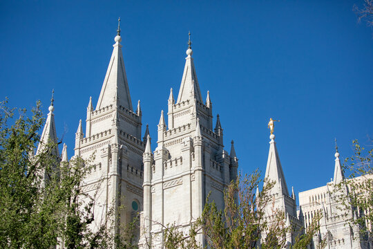 Iconic golden Angel Moroni statue on the spires of the Salt Lake Temple
