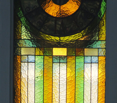 abstract background texture imageo of an antique stained glass window illuminated from behind, create a dramatic interior decoration with oldies ambience