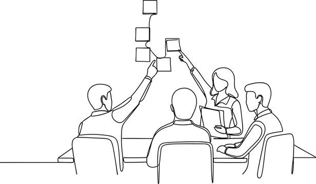 Team brainstorming and planning with sticky notes on wall