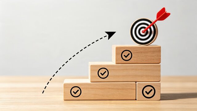 Red arrow hitting bullseye target on top of wooden blocks with checkmarks, symbolizing business success, goal achievement, strategy and progress.