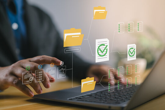 Secure digital document management system with password protected folders and encrypted file access on laptop used by businessman to ensure data safety, organization and workflow efficiency