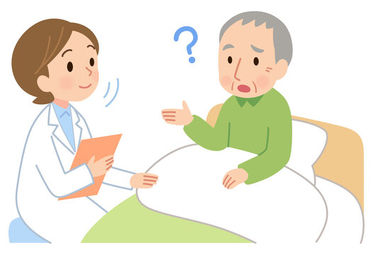 ベッドに座る高齢男性の話を聞く医者　訪問看護