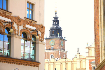 Fototapeta premium Early Morning View of Cloth Hall and Town Hall Tower in Kraków, Poland