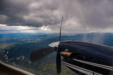 King Air Flying through Rain Showers in Central Alaska near Mcgrath © Nicolo