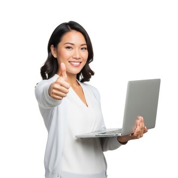 Confident businesswoman holding laptop with thumbs up against white background