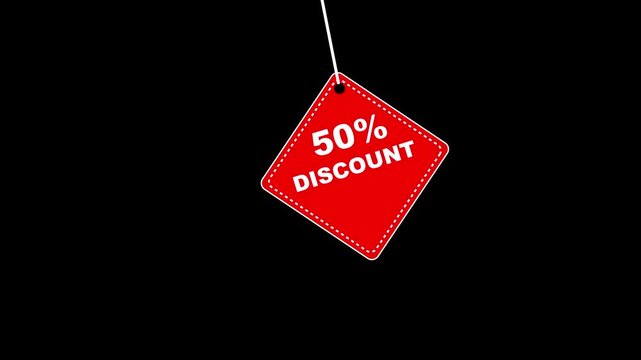 50% discount red tag swinging on string isolated on black background, for retail sales, promotion and marketing
