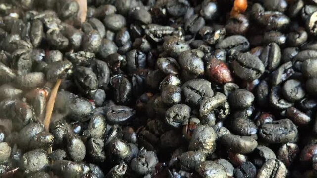 Traditional Coffee Bean Roasting Process on Wood Fire Stove with Thick Smoke