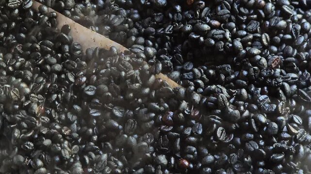 Traditional Coffee Bean Roasting Process on Wood Fire Stove with Thick Smoke