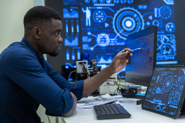 Fototapeta premium Black Researcher Making a Quantum Computing Experiment, Monitoring Live Artificial Intelligence Data on Computer Screen,