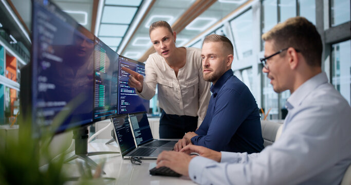 Diverse Team Of Software Engineers Coding Secure Business Applications