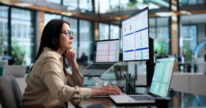 Medical Billing Analyst Reviews Codes And Spreadsheets