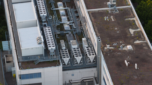 Aerial view of Data Center Dusseldorf 1 in Germany, providing enterprise cloud services and large-scale computing with rooftop HVAC and cooling systems.