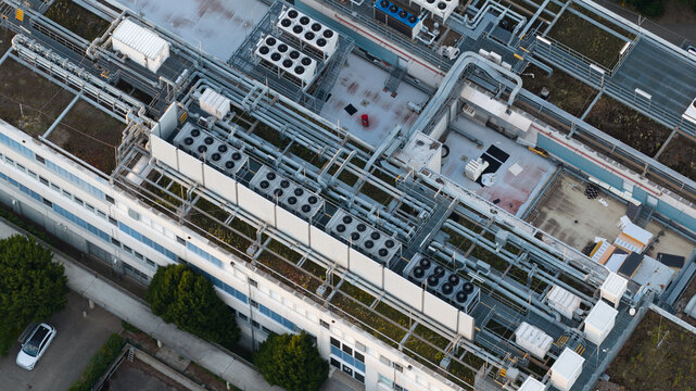 Aerial view of Data Center Dusseldorf 1 in Germany, providing enterprise cloud services and large-scale computing with rooftop HVAC and cooling systems.
