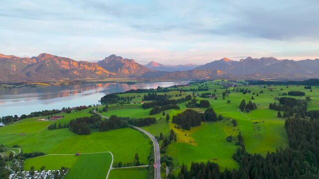 Aerial view of the Lake Forggensee in Alps in the evening, Germany, Europe
