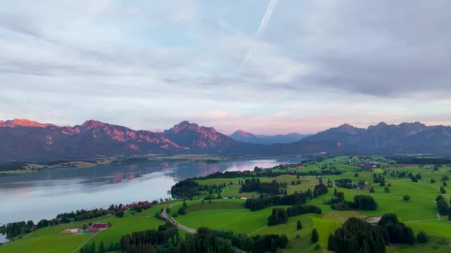 Aerial view of the Lake Forggensee in Alps in the evening, Germany, Europe