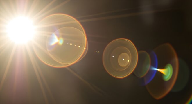 Abstract lens flare photography with bright light and rainbow effects