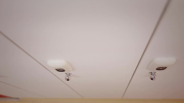 Building fire sprinkler system on a ceiling
