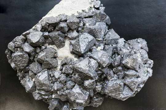 natural magnetite rock close-up on black