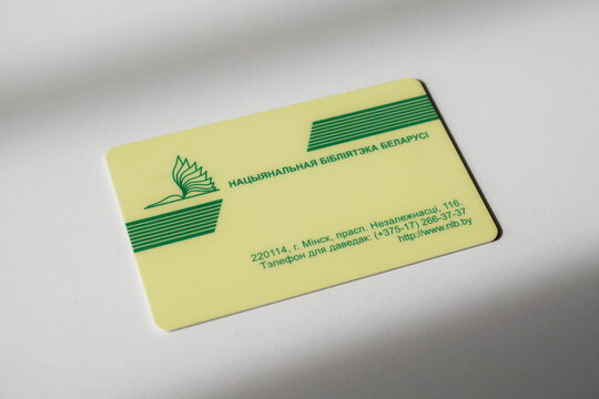 A plastic library card of the National Library of Belarus featuring its official logo and contact information. 