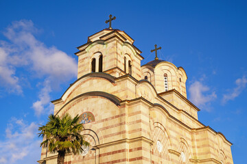 Religious architecture. Domes of Serbian Orthodox Church of Saint Sava in Tivat city against blue sky.  Montenegro © Olga Iljinich