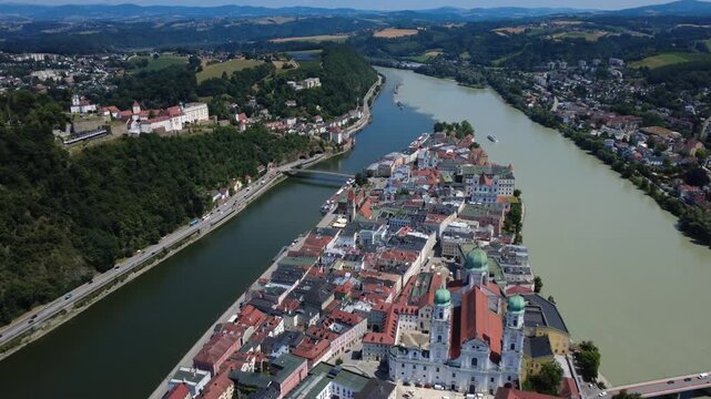Aerial Passau, Germany: cathedral, old town and Danube, toward confluence