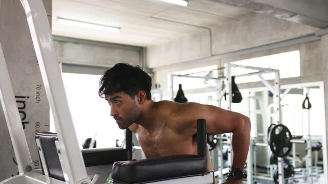 Athlete Performing Dip Exercise on Parallel Bars