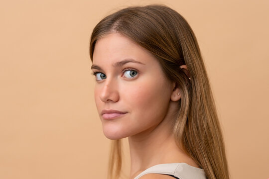 Portrait of blond pretty woman over isotaed background