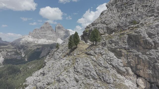 Dramatic Snow-Capped Jagged Mountain Peaks Under Blue Sky