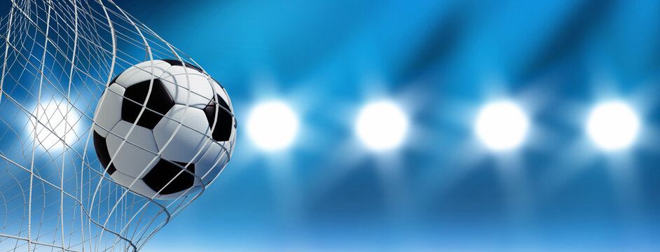 l	
Black and white soccer ball in goal net with blue background and flood light rays - 3D illustration	
