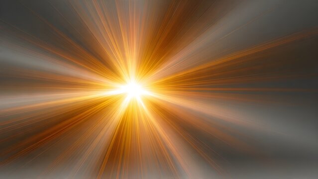 Brilliant burst of light radiates outward with bright orange and yellow rays creating a powerful energy effect against a blurred dark backdrop symbolizing inspiration power and new beginnings in