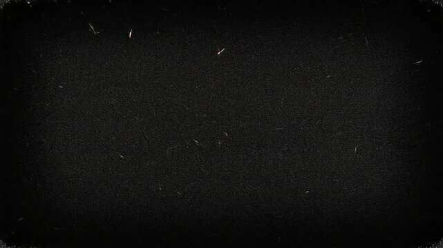 Charcoal Black Grain Texture with Fine Spark Like Noise and Heavy Vignette Edges