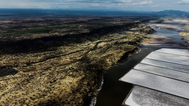Lake Magadi kenya Sodaash Alkaline water salt lake Trona mineral deposits rift valley kenya . kenyan lake with Trona.