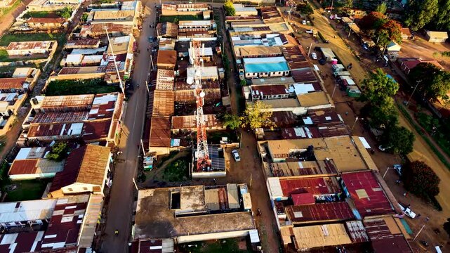 Houses of Kibera slums, roads in Soweto informal settlement nairobi kenya. Drone flying in the rural settlement of kenya slums