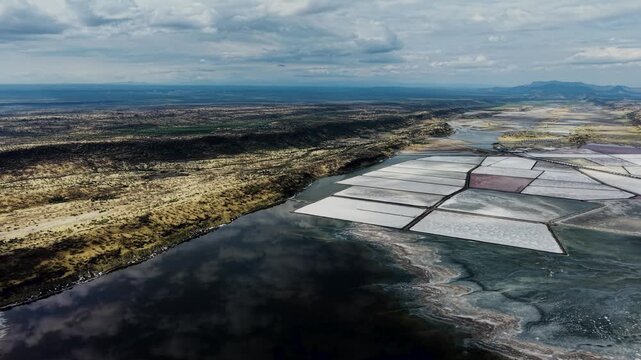 Lake Magadi kenya Sodaash Alkaline water salt lake Trona mineral deposits rift valley kenya . kenyan lake with Trona.