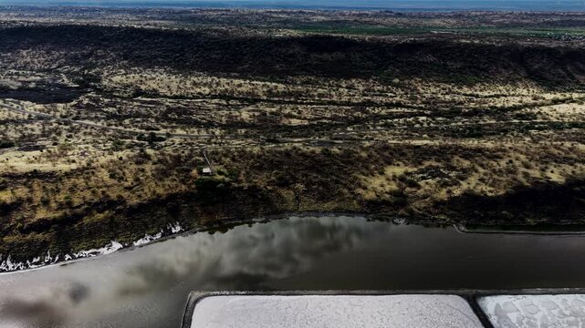 Lake Magadi kenya Sodaash Alkaline water salt lake Trona mineral deposits rift valley kenya . kenyan lake with Trona.