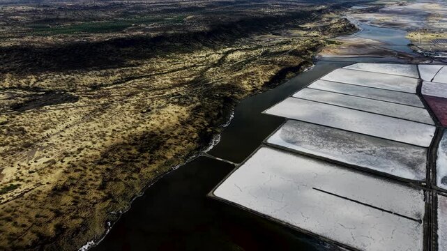 Lake Magadi kenya Sodaash Alkaline water salt lake Trona mineral deposits rift valley kenya . kenyan lake with Trona.