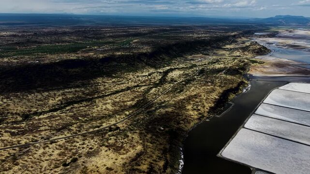 Lake Magadi kenya Sodaash Alkaline water salt lake Trona mineral deposits rift valley kenya . kenyan lake with Trona.