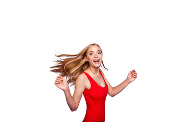 Portrait of attractive excited blonde gorgeous girl wearing red swim suit with opened mouth, wind blows hair, motion. Isolated over violet pastel background © deagreez