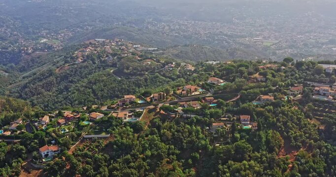 Tanneron France Aerial v18 birds eye view drone flying over mountain ranges with hillside residential houses and hilltop plantations at les mauberts in pegomas - July 2021