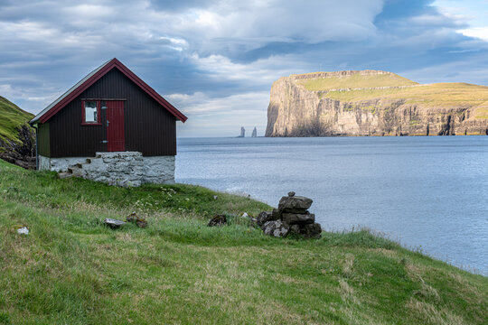 View of Risin and Kellingin (the Giant and the Witch) from Tj&oslash;rnuv&iacute;k village, Faroe Islands