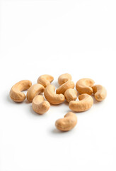 Fototapeta premium Close-up of ten cashew nuts on white background