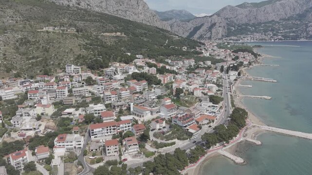 Aerial View of Mediterranean Coastal Town and Turquoise Bay