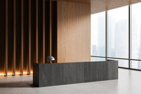 Modern interior lobby with wood slat wall, sleek dark reception counter and panoramic city window view creating elegant contemporary atmosphere. 3D Rendering