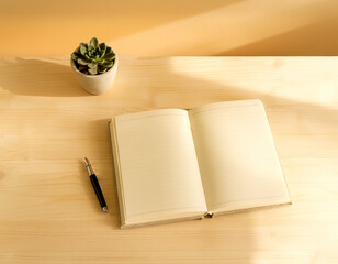 Fototapeta premium Open blank notebook with fountain pen and succulent plant on wooden desk.